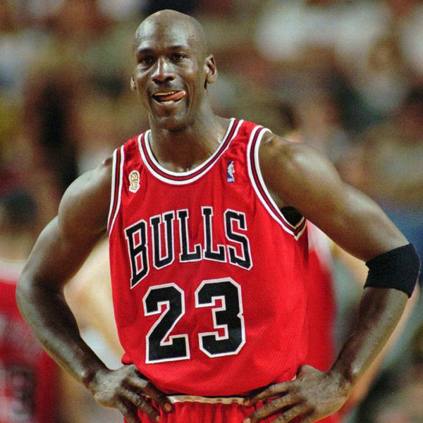 FILE - In this June 9, 1996 file photo Chicago Bulls Michael Jordan stands during a break at the end of an NBA Basketball game against the Seattle SuperSonics in Seattle. A Bismarck, N.D., man who used to own McDonald's restaurants is about $10,000 richer after selling a 20-year-old container of McJordan barbecue sauce Monday, Oct. 15, 2012, to a buyer in Chicago. The sauce was used on McJordan Burgers, named for basketball icon in limited markets for a short time in the 1990s, when Jordan led the Chicago Bulls to six NBA championships. (AP Photo/Beth A. Keiser, File)
