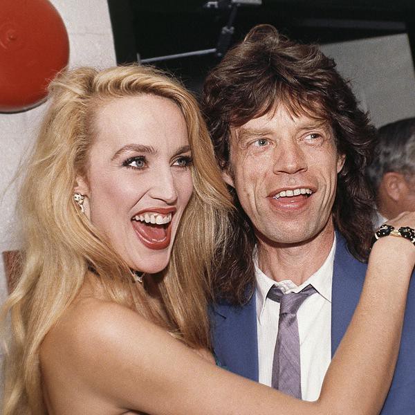 Singer Mick Jagger clowns around with girlfriend Jerry Hall backstage at her debut as “Cherie” in the Theatre East production of William Inge play “Bustop” on July 26, 1988 in the Montclair State College campus, in New Jersey, USA. (AP Photo/Susan Ragan)
