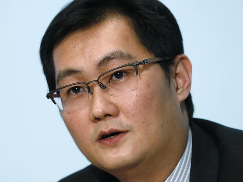PonyMa Huateng, Chairman and CEO of Tencent Holdings Ltd., speaks during a press conference to announce his companies' annual results in Hong Kong Wednesday, March 19, 2014.